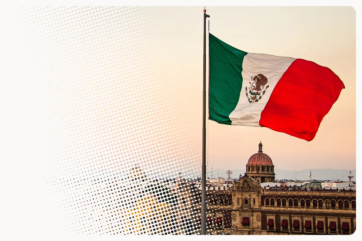Mexican flag flying over Palacio Nacional in Mexico City